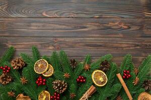 Christmas background with fir branches and Christmas decor. Top view, copy space for text photo