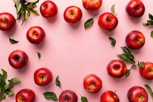 Many red apples on colored background, top view. Autumn pattern with fresh apple above view with copy space for design or text photo