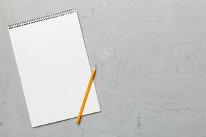 Blank notebook with pen on white background. Back to school and education concept photo