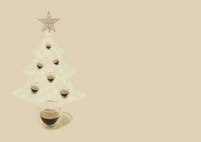 Christmas tree made of steaming coffee with silver star on the top against cream pastel background. Winter holiday concept. Minimal New Year background. Trendy Christmas idea. Copy space. photo