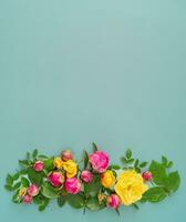 Creative layout with colorful flowers and leaves. Nature concept. Flat lay. Flowers aesthetic. photo