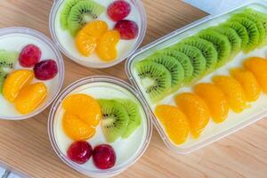 Fruity milk pudding, sweet chocolate silk pudding dessert with fruit topping photo