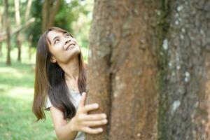 world saving concept Female tourists are happy amidst nature photo