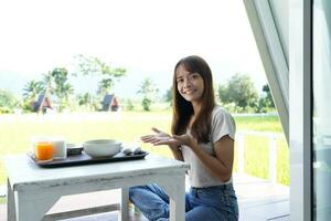 Asian female tourists eating breakfast photo