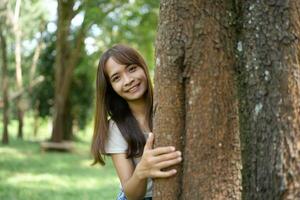 world saving concept Female tourists are happy amidst nature photo