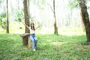 world saving concept Female tourists are happy amidst nature photo