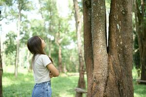 world saving concept Female tourists are happy amidst nature photo