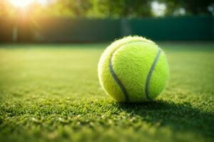 Tennis ball on the green field with sunlight. Sport concept. AI Generative photo