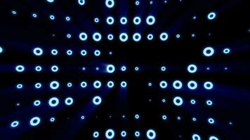 Abstract background of bright blue glowing light bulbs from circles and dots of energy magic disco wall video