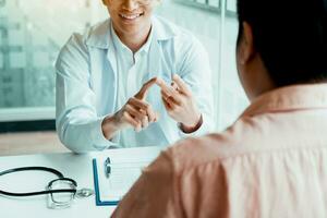 Doctor is explaining the treatment about the possible treatment of patients in the future. photo