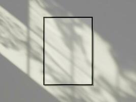 Frame mockup hanging on the wall with minimal window shadow photo