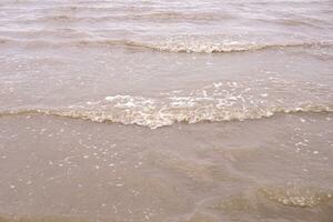 beautiful waves in a sand photo