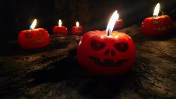 Close-up on a Jack O Lantern candles glowing in the dark video