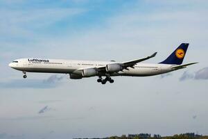 Lufthansa Airbus A340-600 D-AIHK passenger plane arrival and landing at Munich Airport photo