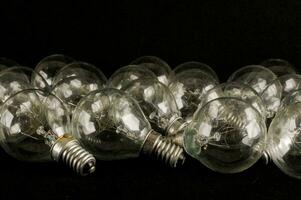 Lightbulbs on black background photo