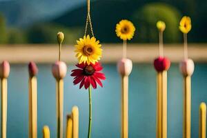 sunflowers and flowers are hanging from sticks. AI-Generated photo
