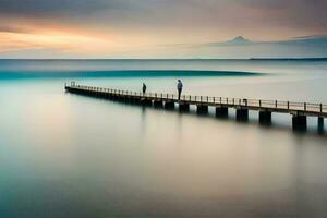 two people stand on a pier looking out at the ocean. AI-Generated photo