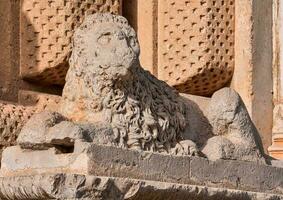 Detail of a lion sculpture photo