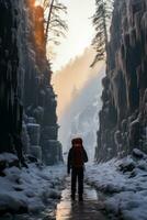 Frozen solitude fearless climber navigates serene yet treacherous icy waterfall photo