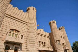 An old castle with flags photo