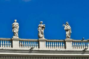 Saint Peter's Square statues photo