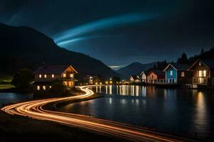 un largo exposición fotografía de un río y casas a noche. generado por ai foto