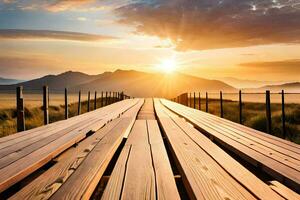 a wooden bridge over a field with the sun setting behind it. AI-Generated photo