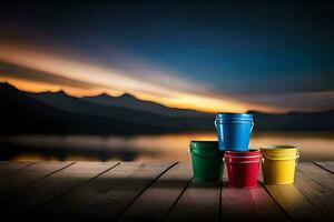 colorful buckets on a wooden deck with mountains in the background. AI-Generated photo