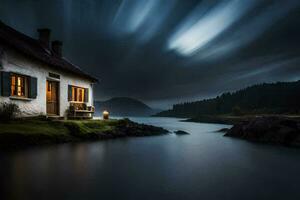 a small cottage on the shore of a lake at night. AI-Generated photo