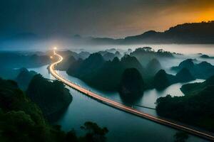 un largo puente terminado un río con niebla y montañas en el antecedentes. generado por ai foto