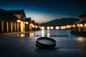 a bowl sitting on the ground in front of a lake. AI-Generated photo