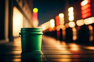 a green bucket sitting on the sidewalk at night. AI-Generated photo