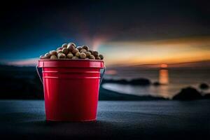 a bucket of peanuts on a beach at sunset. AI-Generated photo