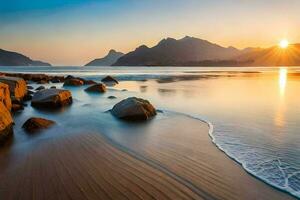 the sun sets over a beach with rocks and water. AI-Generated photo