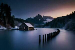 un cabina en el nieve en un lago. generado por ai foto