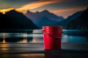 a red bucket sitting on a dock overlooking a lake. AI-Generated photo