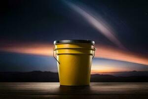 a yellow bucket sitting on a wooden table with a sunset in the background. AI-Generated photo