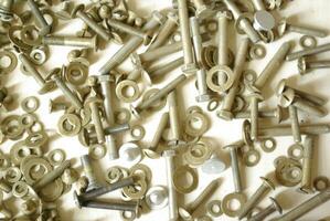 Screws, nuts and washers. Background made of bolts and nuts photo