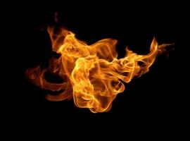 Fire flames on a black background photo