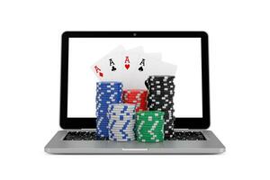 Casino Online Concept. Gambling Chips and Poker Playing Cards with Modern Laptop Computer. 3d Rendering photo