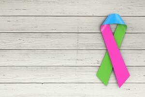 Rare Disease Day Concept. Realistic Pink, Green and Blue Ribbon. 3d Rendering photo
