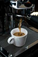 Esspresso Coffee Maker Pouring Hot Drip photo