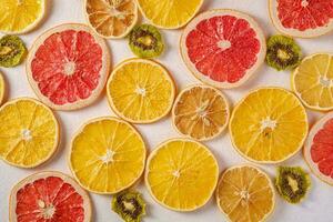 Variety of citrus fruit including lemons, lines, grapefruits and oranges. photo