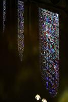 Lincoln, Lincolnshire, UK,  September 19. Reflection of stained glass windows in the font of the Cathedral in Lincoln, Lincolnshire on September 19, 2023 photo