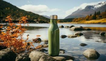 Refreshing drink in nature water, mountain, forest, autumn, bottle generated by AI photo