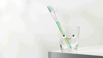 Glass of water and toothbrush smile to welcome the new morning. video