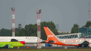 NOVOSIBIRSK, RUSSIAN FEDERATION JUNE 17, 2020 - Commercial jet plane Embraer E170, VQBYK of S7 Airlines taxiing at Tolmachevo Airport, Novosibirsk video