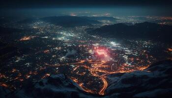 Nighttime aerial view of snow covered mountain peaks and cityscape illuminated generated by AI photo