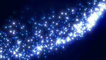 Abstract blue background of small bright glowing particles of energy stars, star dust from a comet tail video