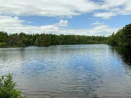 un ver de el lago distrito a alto represa tarn cerca Windermere foto